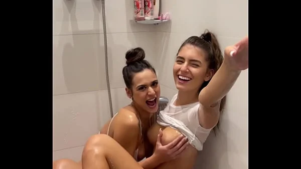 Lesbian shower explodes into sloppy double BJ and huge facial with cum swap POV Blowjob