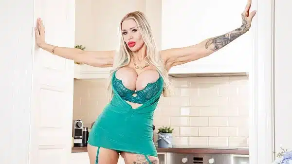 Tania Amazon is in the kitchen, but she’s not cooking. She’s fucking herself with a big toy