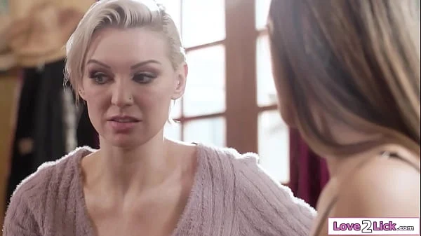 Alexia Anders gives her stepmom Kenzie Taylor an expensive gift. The milf gets flattered, kisses her stepdaughter and lets her lick her hairy pussy