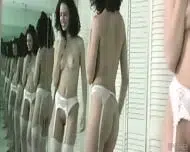 Delicate Beauty Poses in White Lingerie and Soft Natural Light