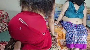 Amazing moves of Indian beautiful ass on a chair dressed in a red saree during live show