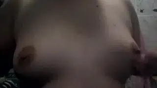 Playing with own boobs