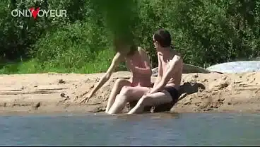 Beach Voyeur. Skinny redhead teen gets fucked on the river coast